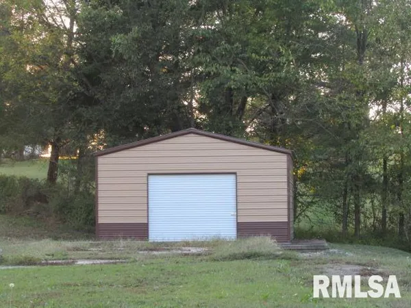 a front view of house with yard