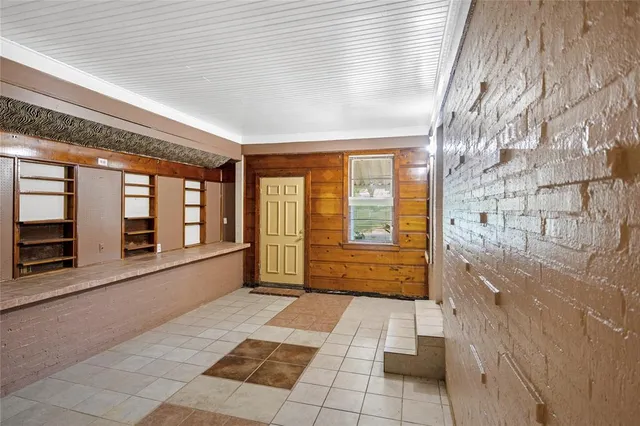 a view of an entryway with a window