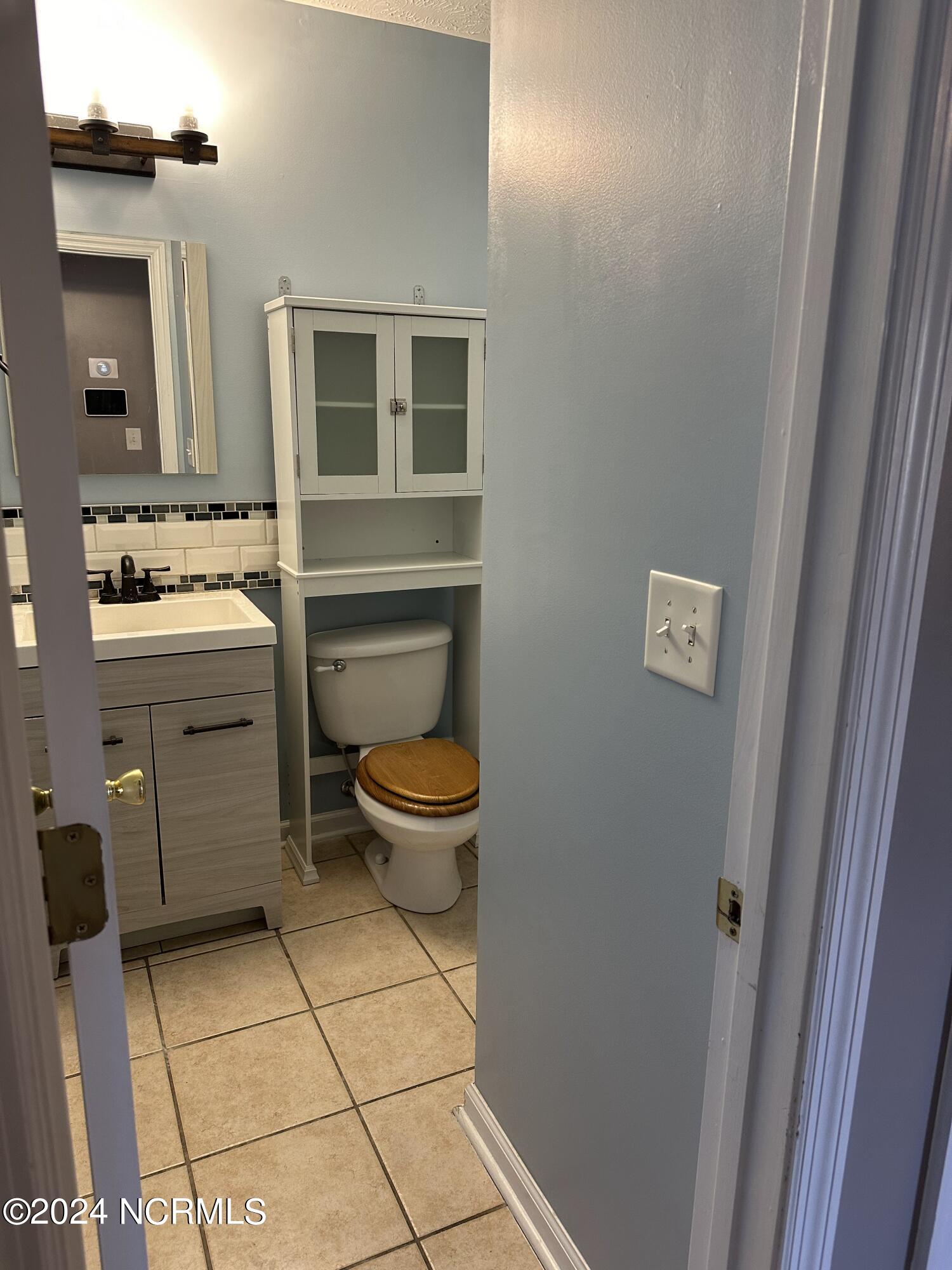 213 Rutherford Way Jacksonville, NC 28540 - Photo 45 of 85 Downstairs Bathroom