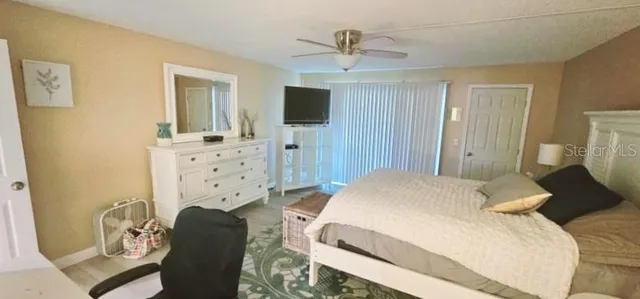 a bedroom with a bed and furniture
