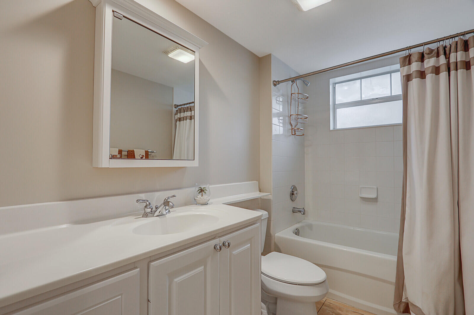 101 St Pierre Way Jupiter, FL 33458 - Photo 10 of 57 a bathroom with a sink a toilet and shower