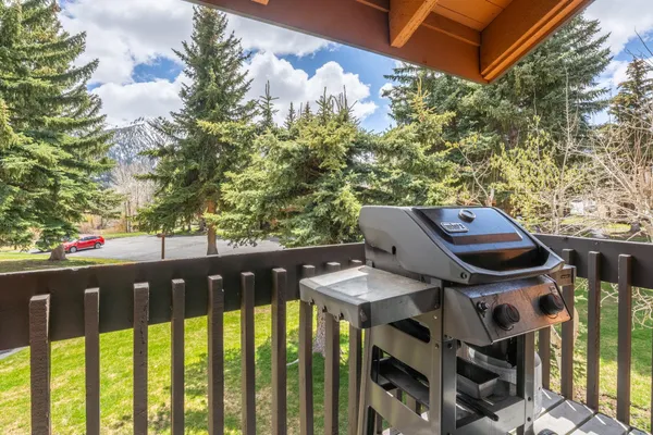 a view of a balcony with chairs