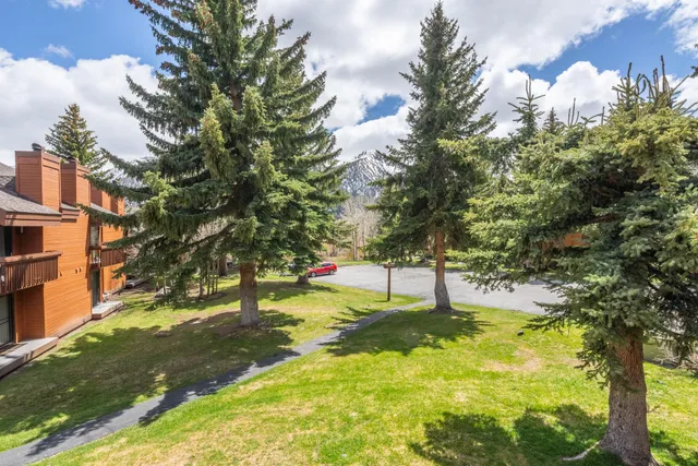 a view of swimming pool with a bench