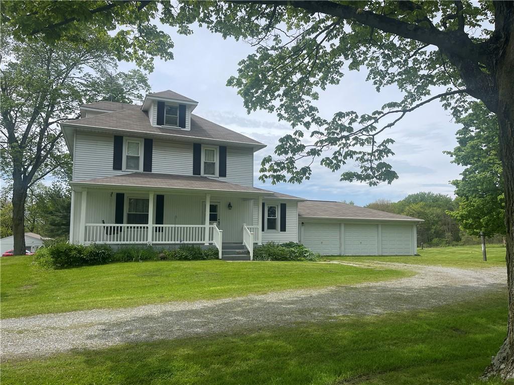 1055 East Lake Road Transfer, PA 16154 - Photo 1 of 27 a front view of a house with garden