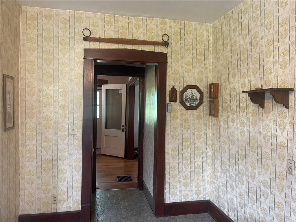 1055 East Lake Road Transfer, PA 16154 - Photo 17 of 27 a view of a hallway with wooden door