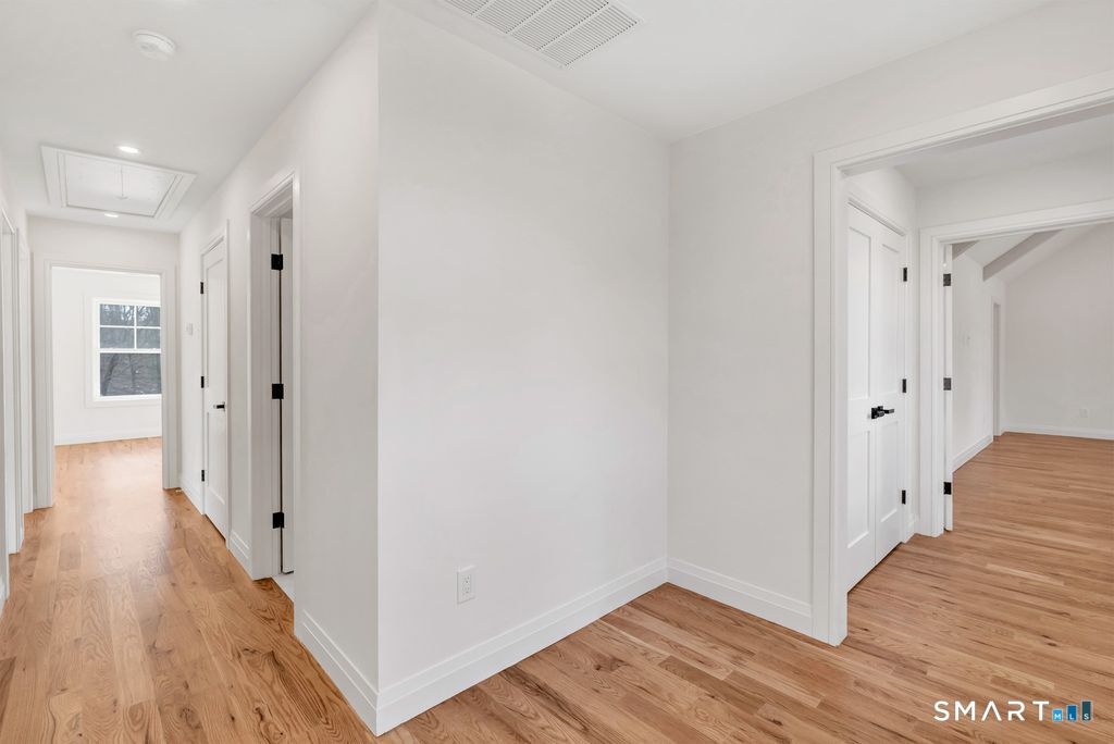 100 Tashua Road Trumbull, CT 06611 - Photo 16 of 26 a view of a hallway with wooden floor