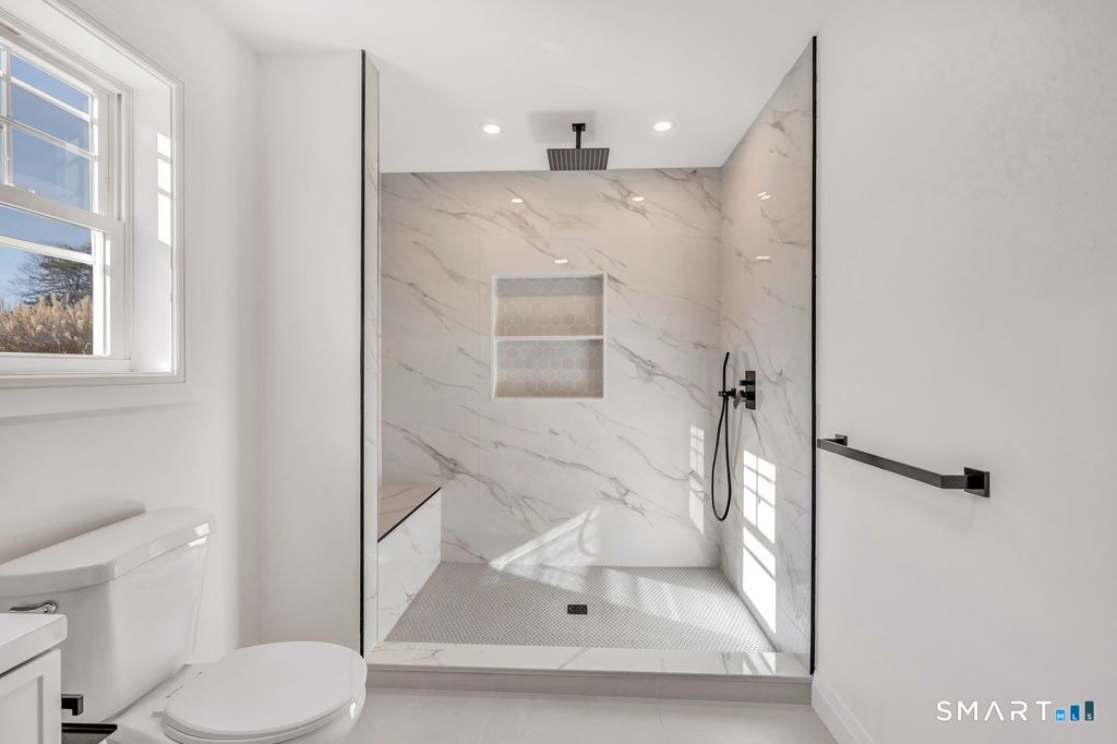 100 Tashua Road Trumbull, CT 06611 - Photo 9 of 26 a bathroom with a shower and toilet