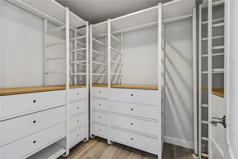a view of an empty walk in closet