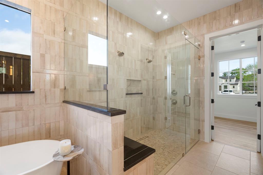 3316 Ferguson Road Grapevine, TX 76092 - Photo 15 of 39 a bathroom with a shower and a sink
