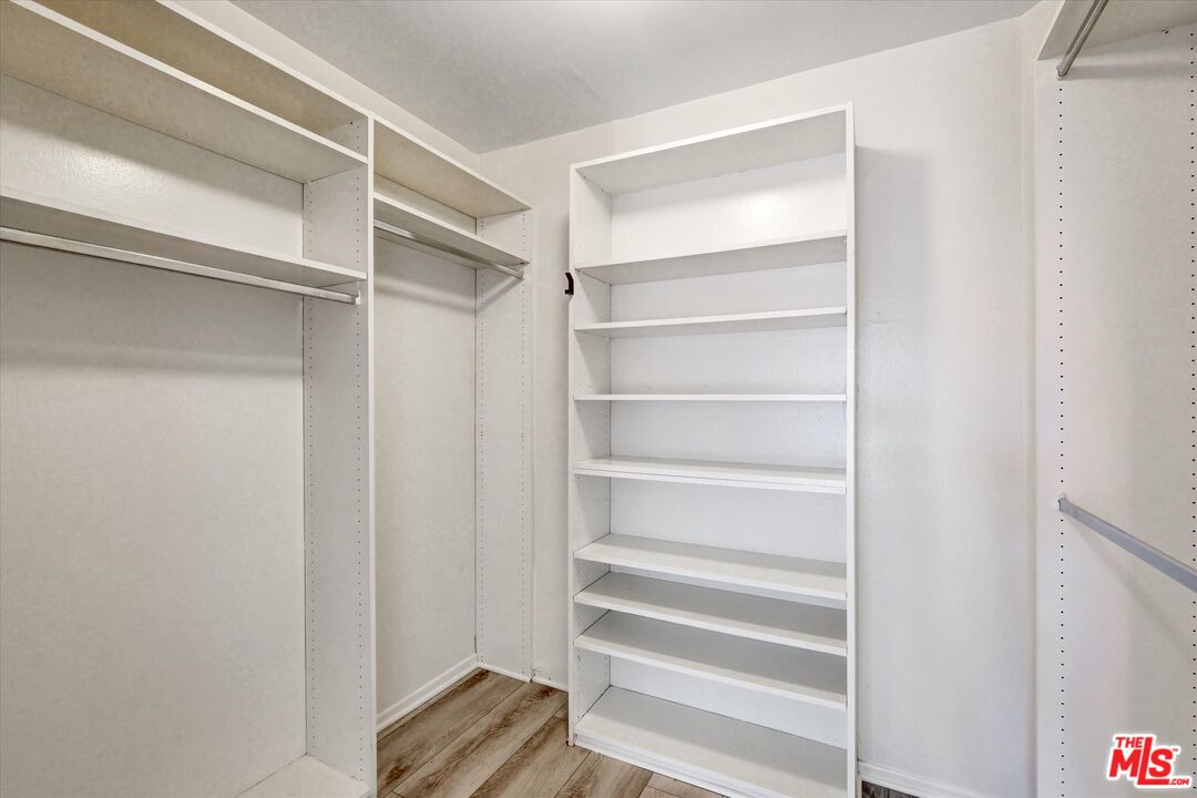 10600 Wilshire Boulevard, Unit 519 Los Angeles, CA 90024 - Photo 19 of 27 a view of walk in closet with empty racks