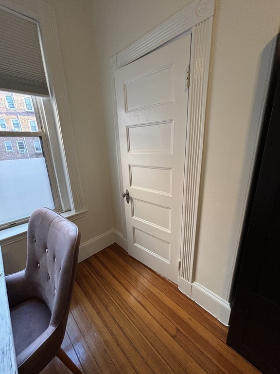 24 Peterborough Street, Unit 8 Boston, MA 02215 - Photo 8 of 9 a room with chair and a window