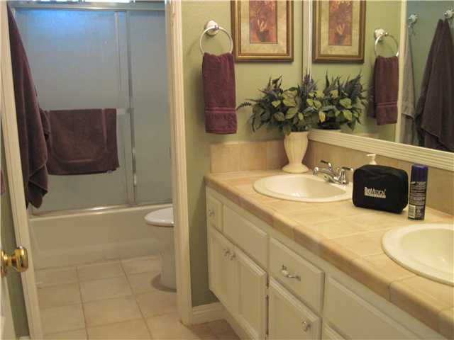 4824 Baroque Terrace Oceanside, CA 92057 - Photo 15 of 24 Upstairs full bath for 3 bedrooms.