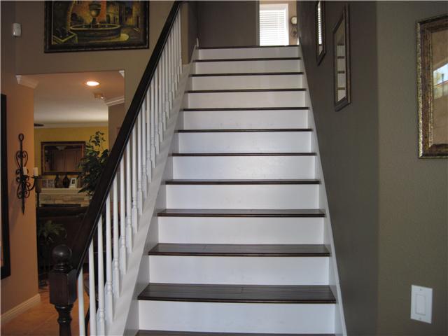 4824 Baroque Terrace Oceanside, CA 92057 - Photo 17 of 24 Wide open staircase with custom banister.