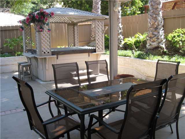 4824 Baroque Terrace Oceanside, CA 92057 - Photo 18 of 24 More patio area with spa (currently problems with switch and we have not looked into repair)