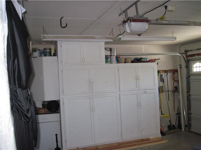4824 Baroque Terrace Oceanside, CA 92057 - Photo 20 of 24 Extra storage in your garage and there is also a little work shop, not shown.