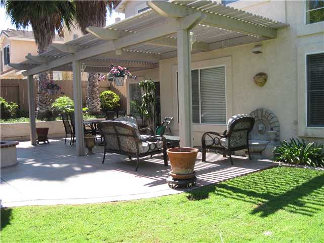 4824 Baroque Terrace Oceanside, CA 92057 - Photo 4 of 24 Great backyard with attractive use of newer landscape and hardscape.