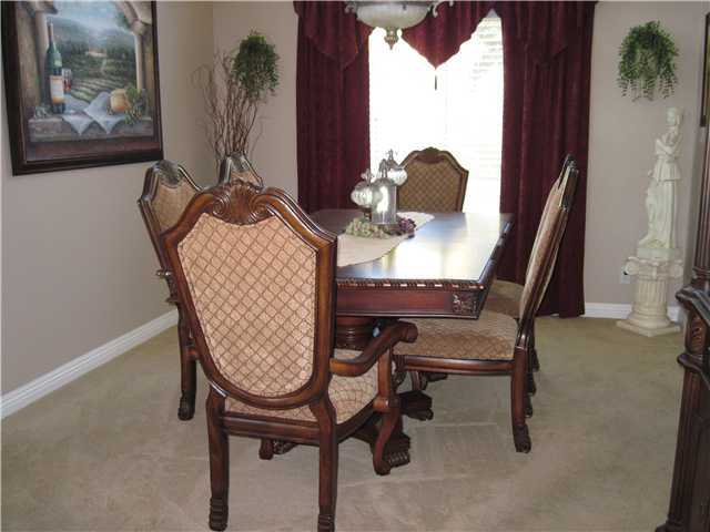 4824 Baroque Terrace Oceanside, CA 92057 - Photo 5 of 24 Formal dining room with high ceilings.