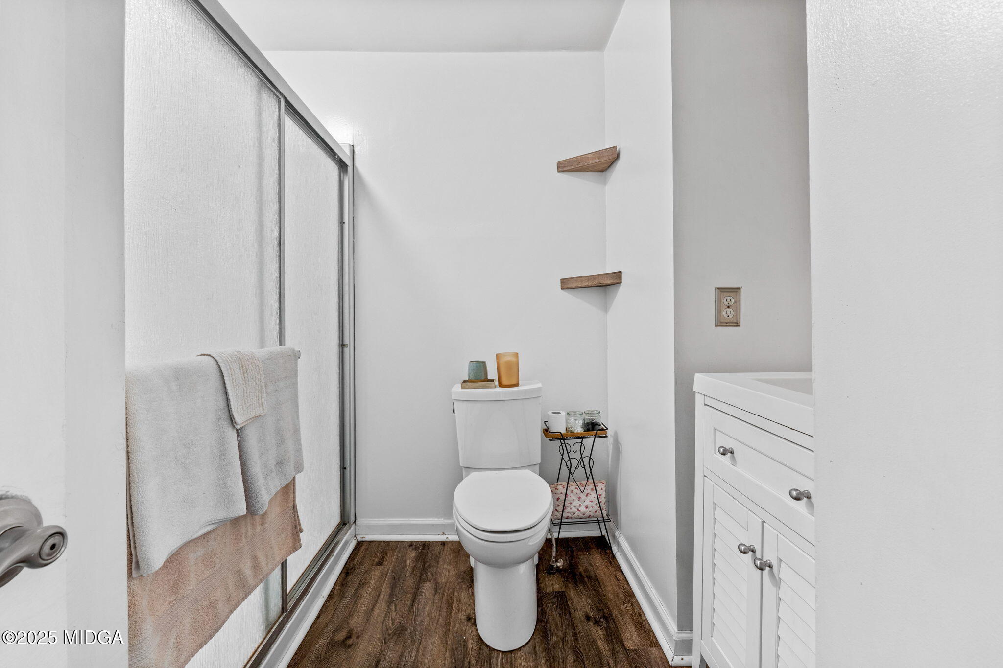 532 Henry Higgins Road Jackson, GA 30233 - Photo 17 of 43 a bathroom with a toilet and a shower