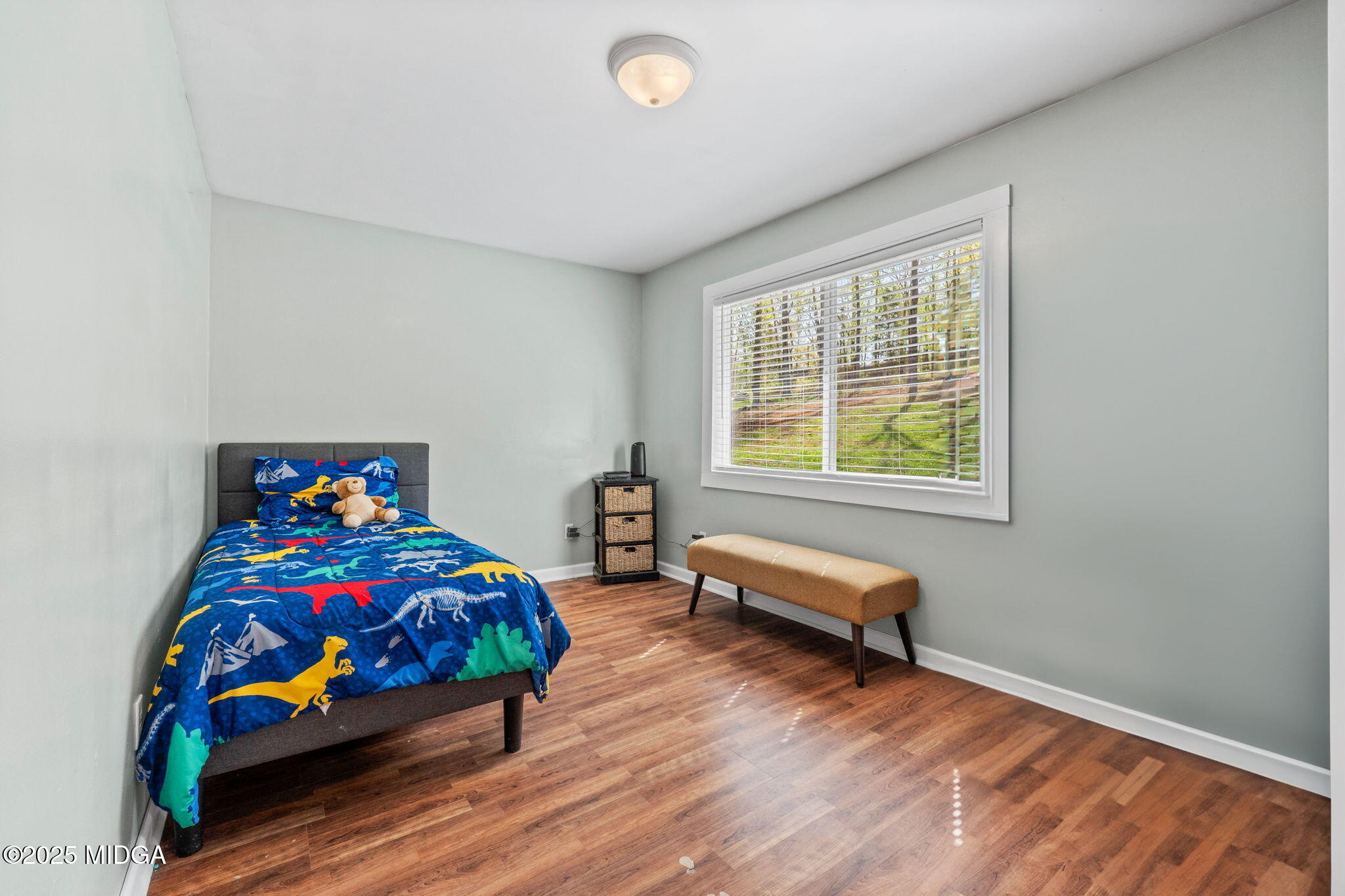 532 Henry Higgins Road Jackson, GA 30233 - Photo 21 of 43 a bedroom with bed and a window