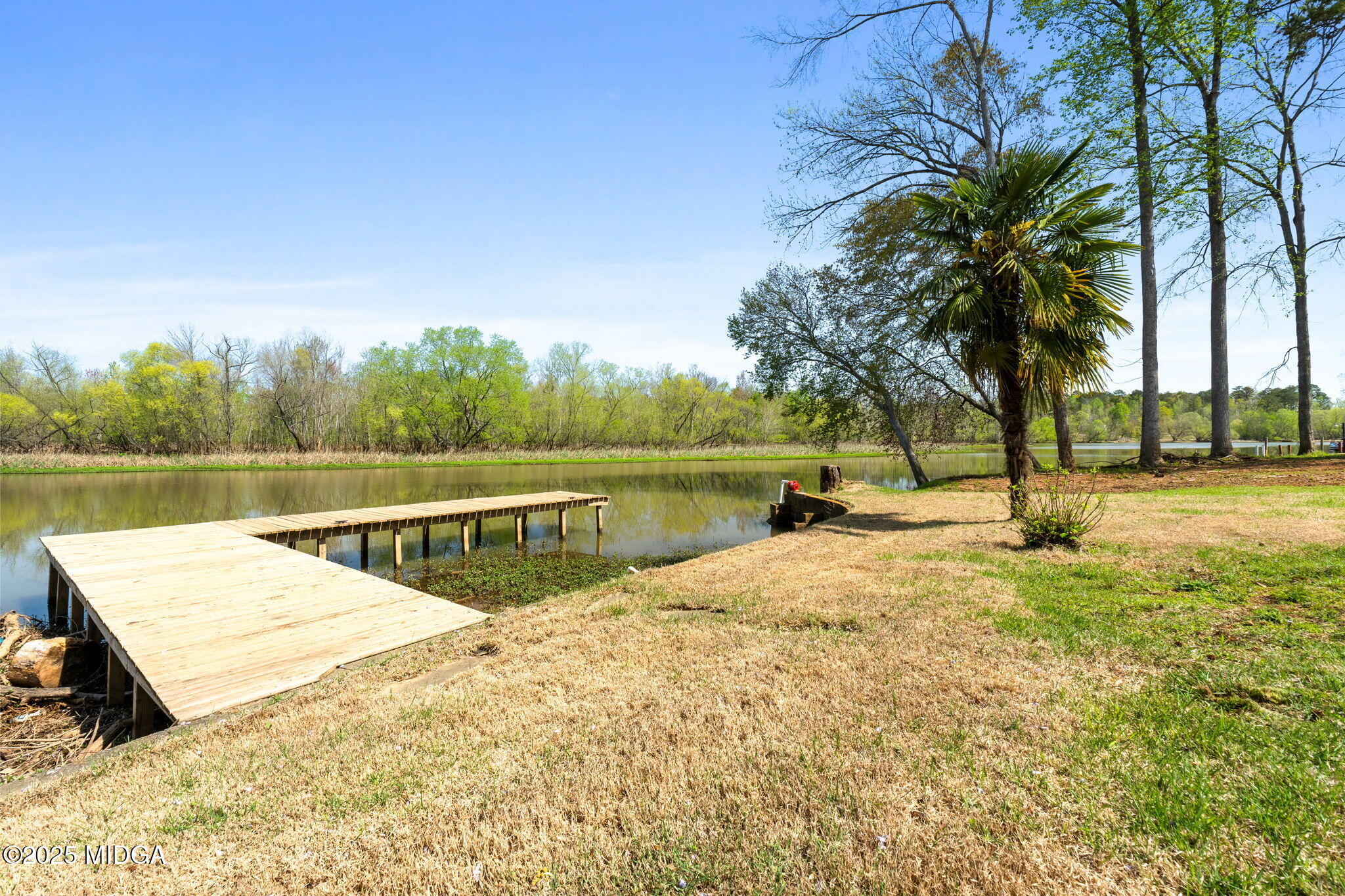 532 Henry Higgins Road Jackson, GA 30233 - Photo 28 of 43 a view of lake with a slide