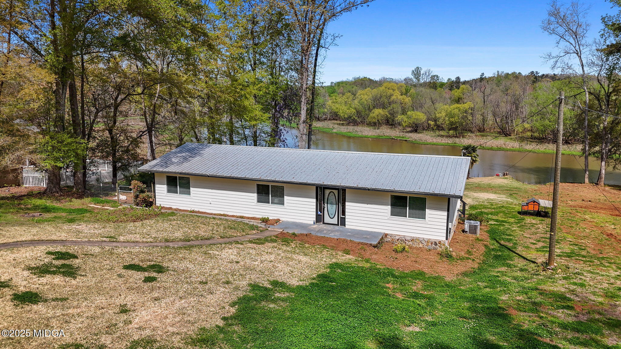 532 Henry Higgins Road Jackson, GA 30233 - Photo 34 of 43 a house view with a garden space