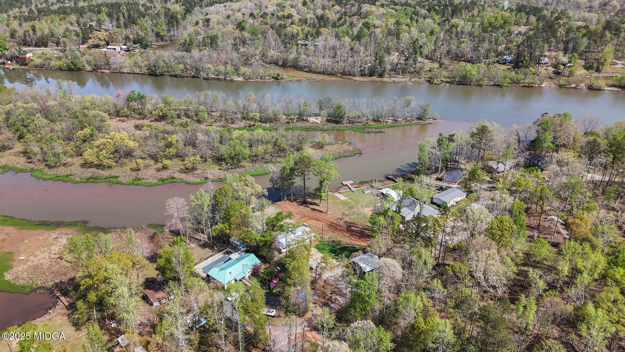 532 Henry Higgins Road Jackson, GA 30233 - Photo 37 of 43 an aerial view of a houses with outdoor space and lake view