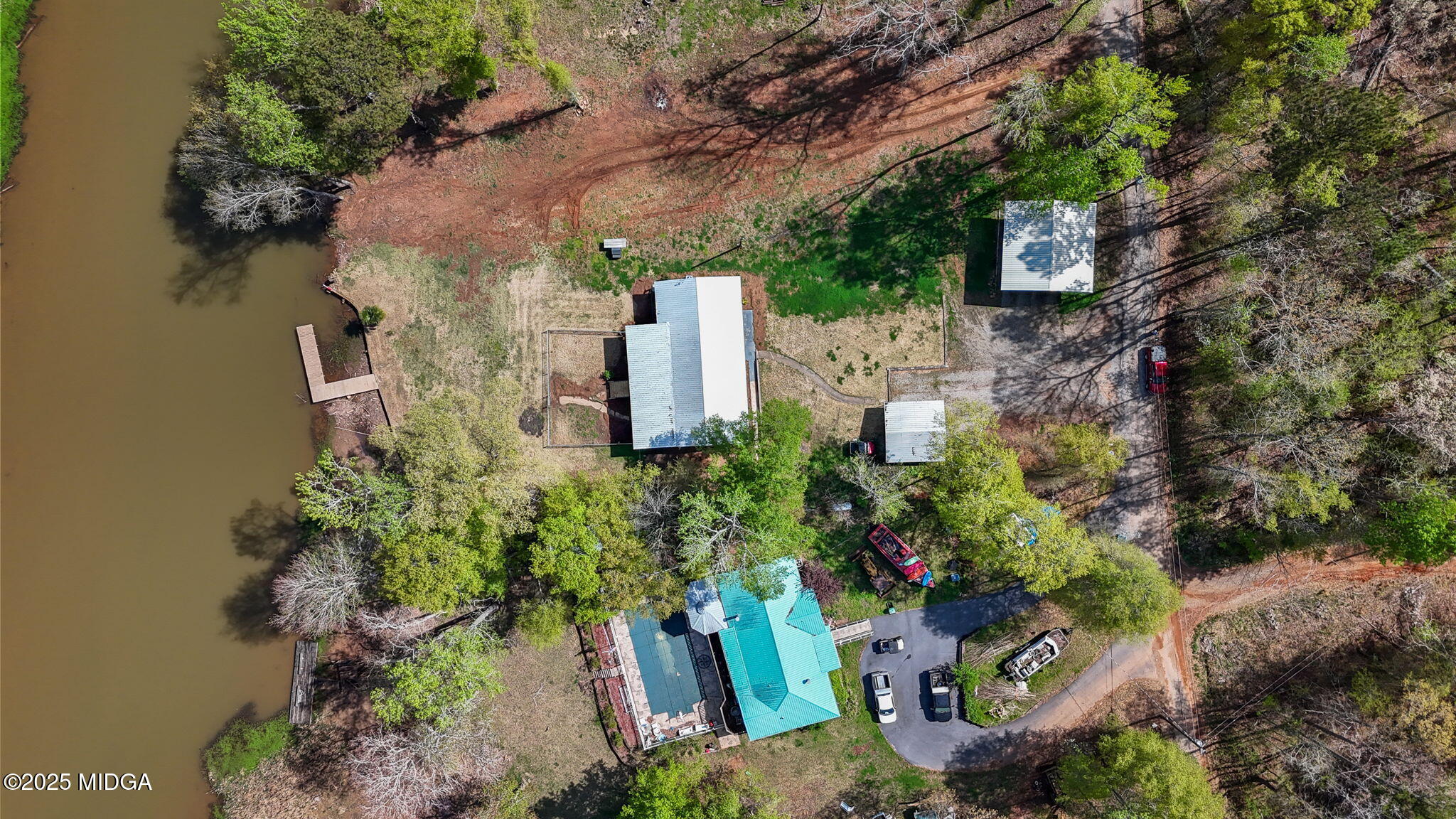 532 Henry Higgins Road Jackson, GA 30233 - Photo 38 of 43 an aerial view of a house with a yard and garden