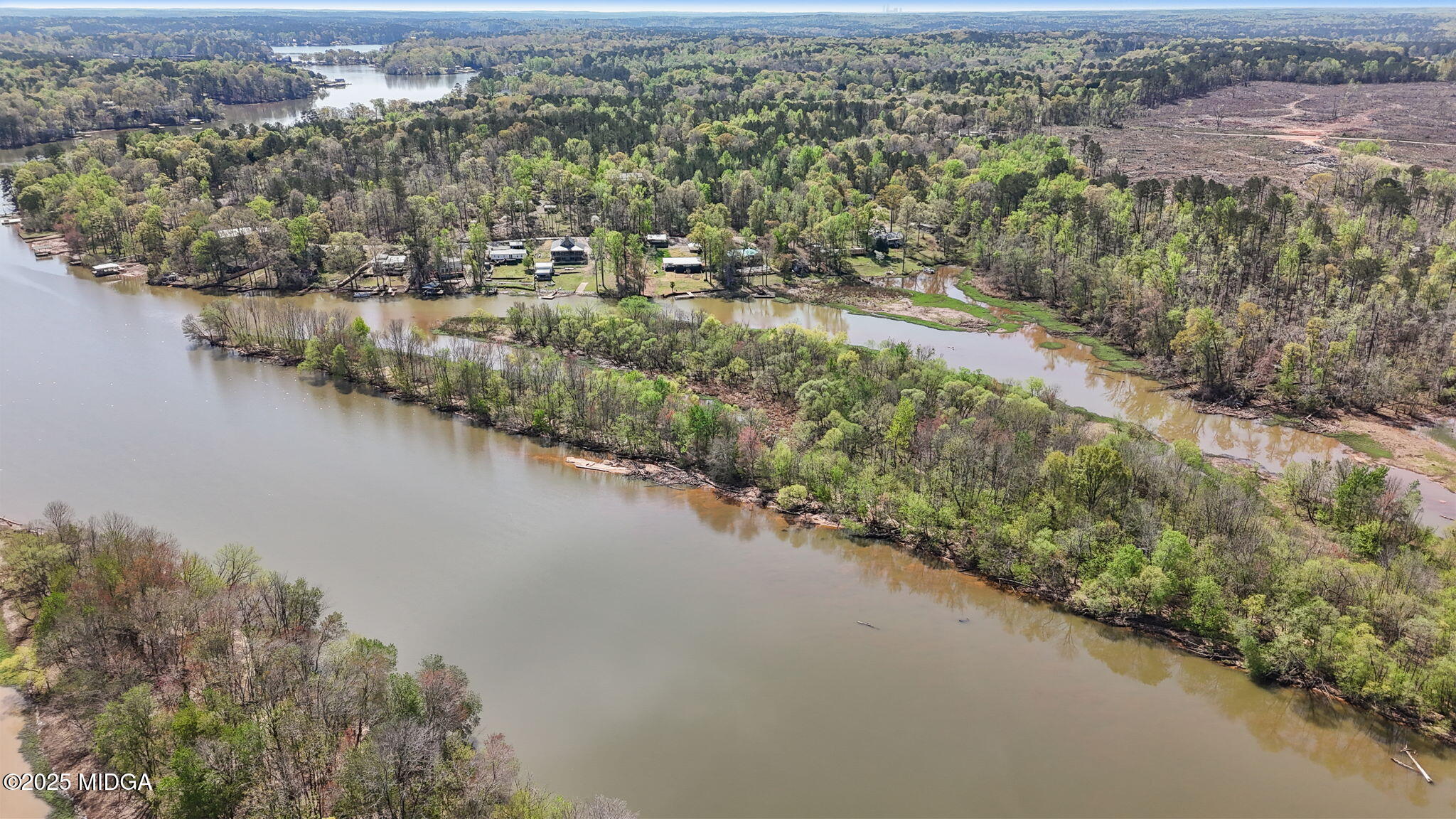 532 Henry Higgins Road Jackson, GA 30233 - Photo 40 of 43 an aerial view of a city with mountains