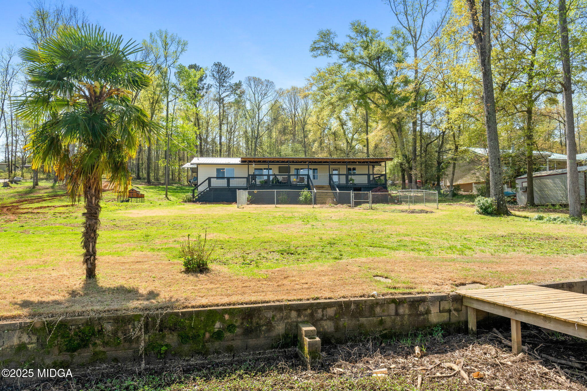 532 Henry Higgins Road Jackson, GA 30233 - Photo 41 of 43 a view of a swimming pool with an outdoor space and seating area
