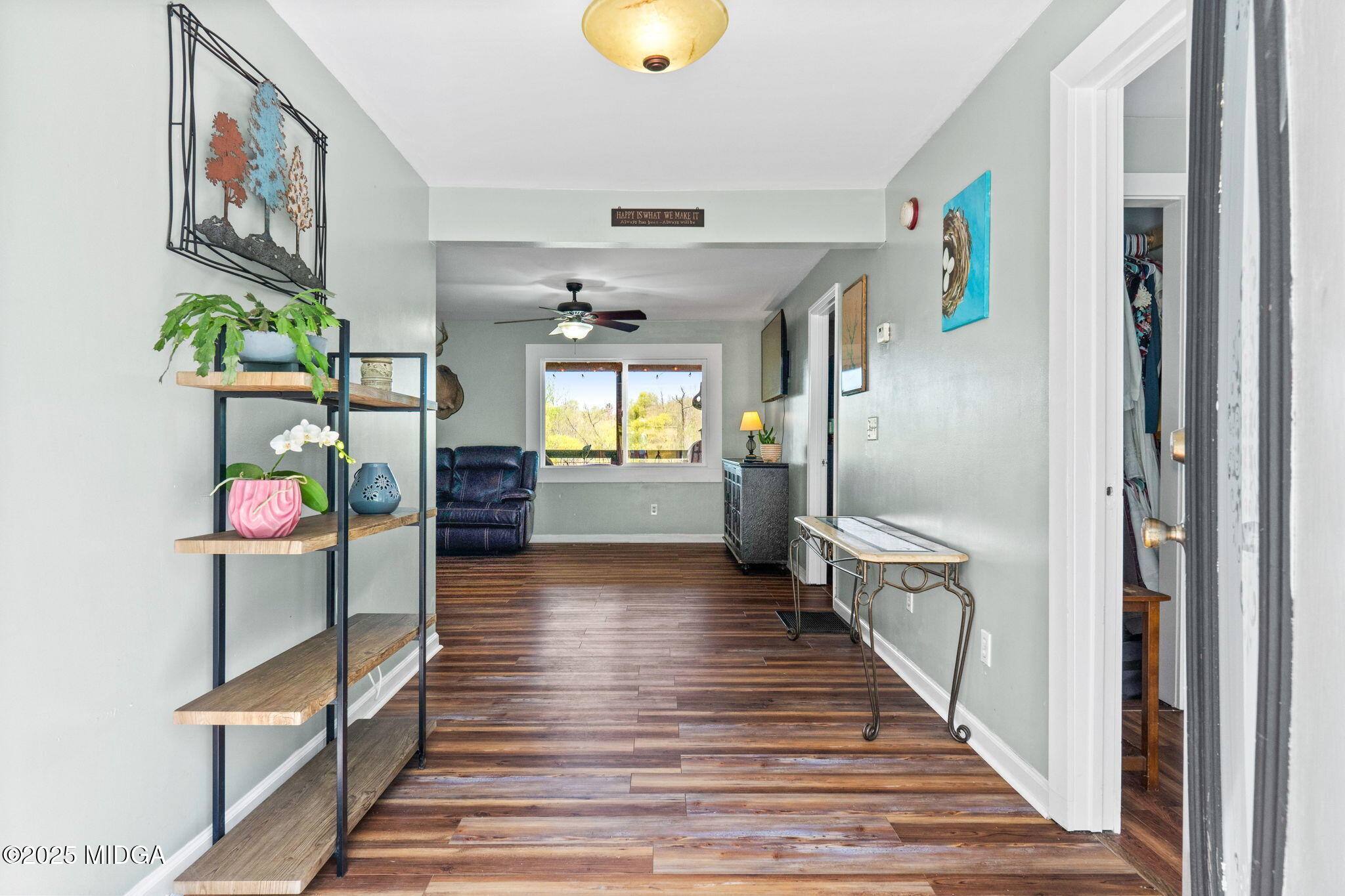 532 Henry Higgins Road Jackson, GA 30233 - Photo 5 of 43 a view of a hallway view with wooden floor and staircase