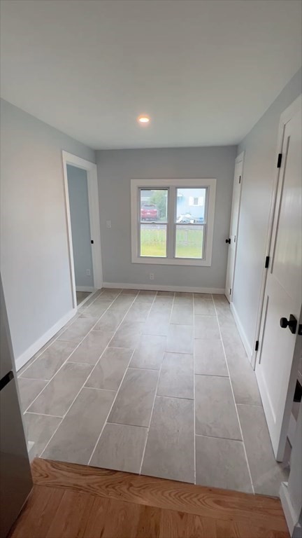 308 East Main Street Orange, MA 01364 - Photo 10 of 21 a view of an empty room with a window