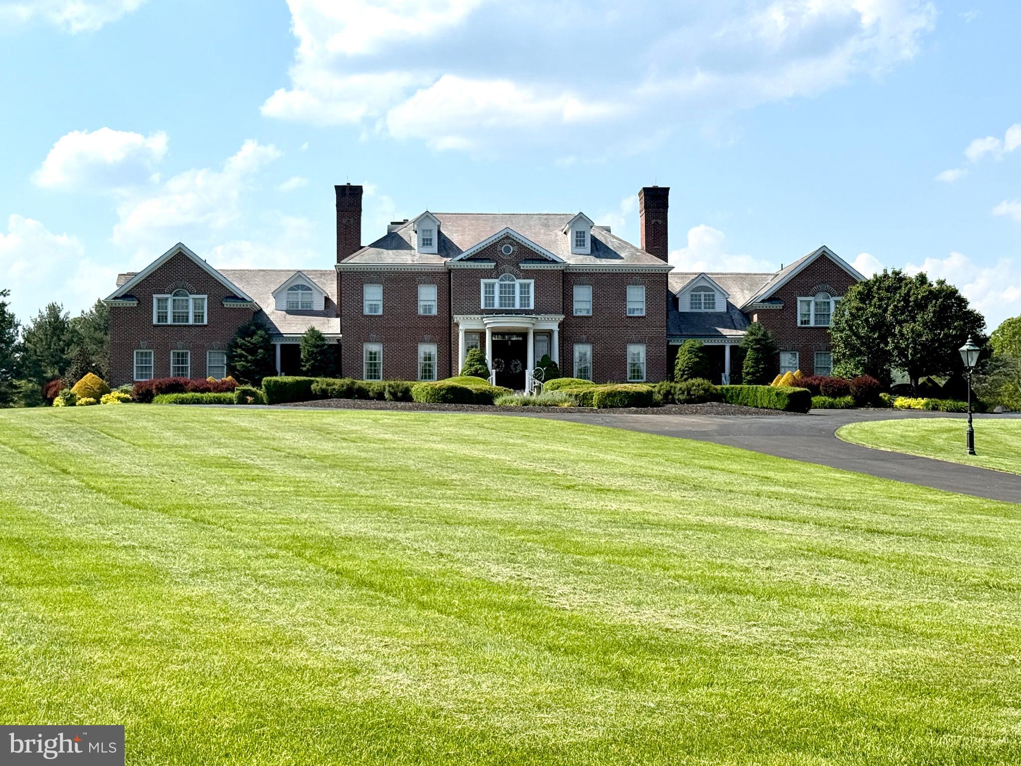 5981 Atkinson Road New Hope, PA 18938 - Photo 1 of 1 a view of a big house with a big yard and large trees