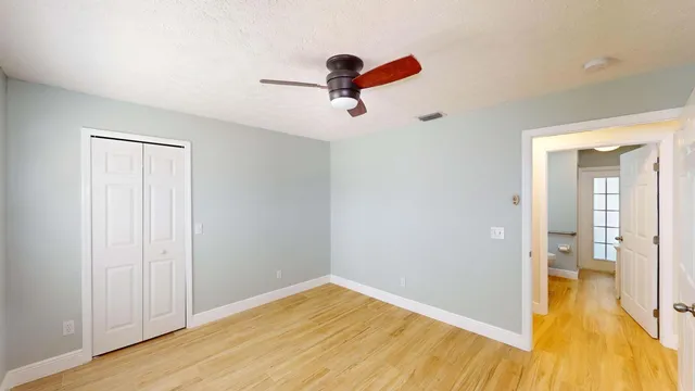 a view of a swimming pool with an outdoor seating