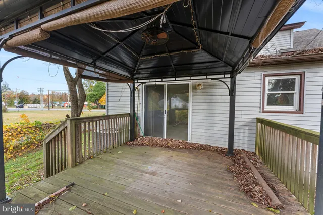 a view of a porch of a house