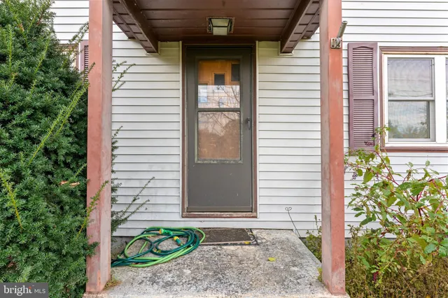 a front view of a house with a window