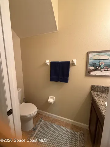 a bathroom with a toilet and a sink