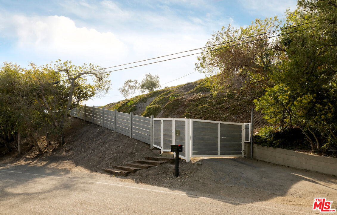 29500 Heathercliff Road, Unit 211 Malibu, CA 90265 - Photo 2 of 41 a view of outdoor space and yard