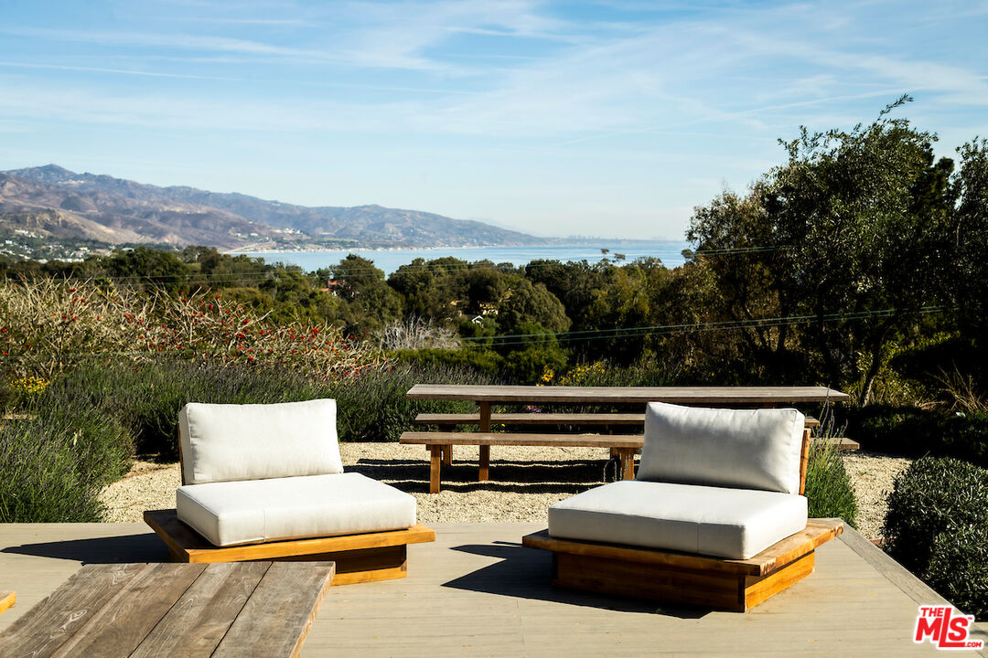 29500 Heathercliff Road, Unit 211 Malibu, CA 90265 - Photo 30 of 41 a view of outdoor space with seating