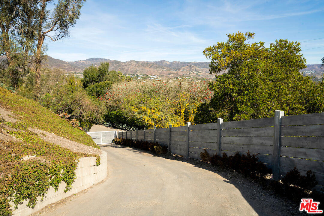 29500 Heathercliff Road, Unit 211 Malibu, CA 90265 - Photo 4 of 41 a view of a backyard