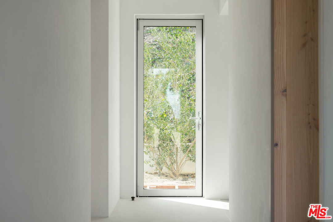 29500 Heathercliff Road, Unit 211 Malibu, CA 90265 - Photo 8 of 41 a view of a room that has a window in it