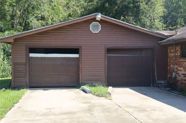 a front view of a house with a garage