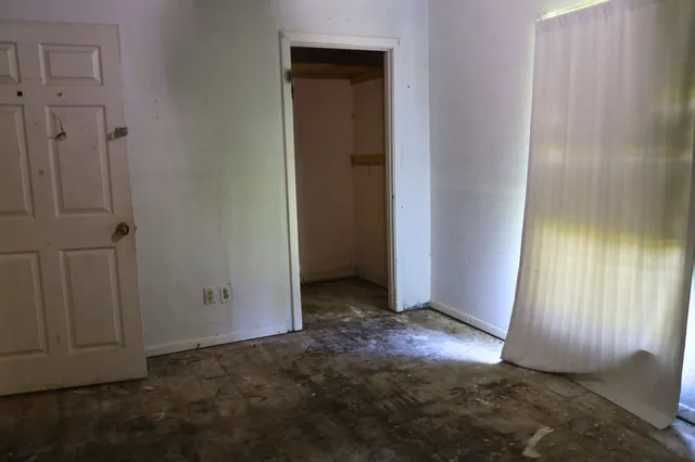 an empty room with windows