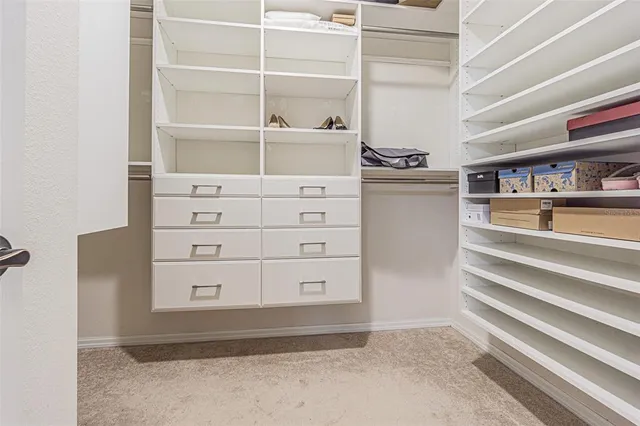 a view of an empty walk in closet