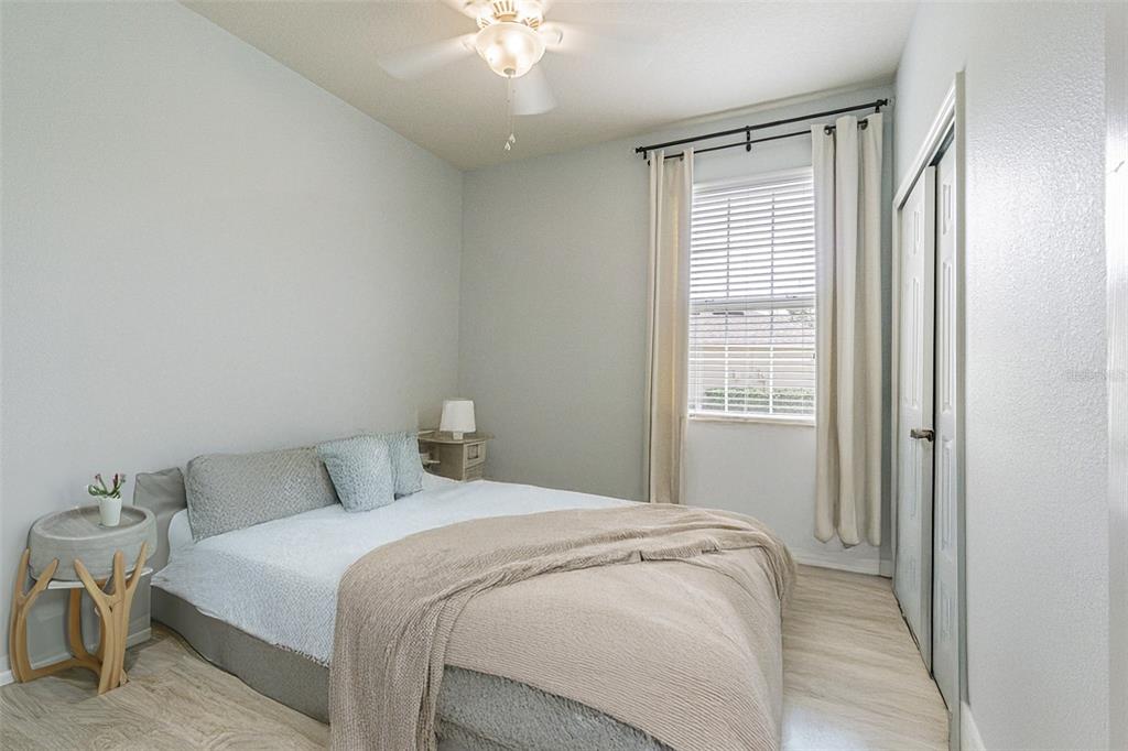 4256 Ashton Meadows Way Wesley Chapel, FL 33543 - Photo 17 of 42 a bedroom with a bed and a window