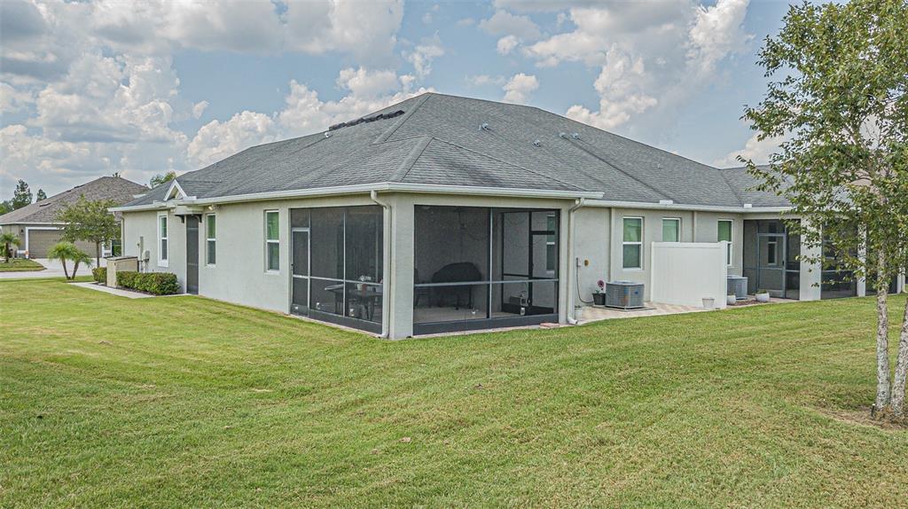 4256 Ashton Meadows Way Wesley Chapel, FL 33543 - Photo 23 of 42 a house view with a garden space