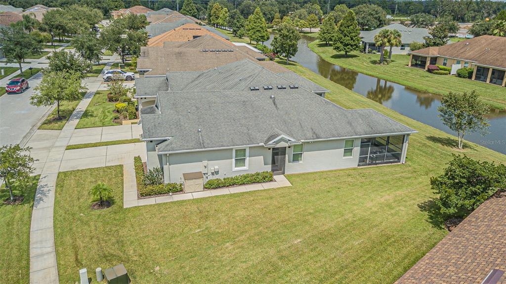 4256 Ashton Meadows Way Wesley Chapel, FL 33543 - Photo 31 of 42 an aerial view of residential houses with outdoor space