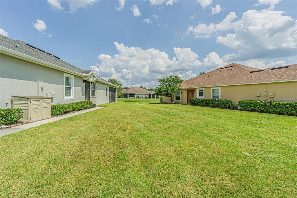 4256 Ashton Meadows Way Wesley Chapel, FL 33543 - Photo 32 of 42 a view of a house with a yard