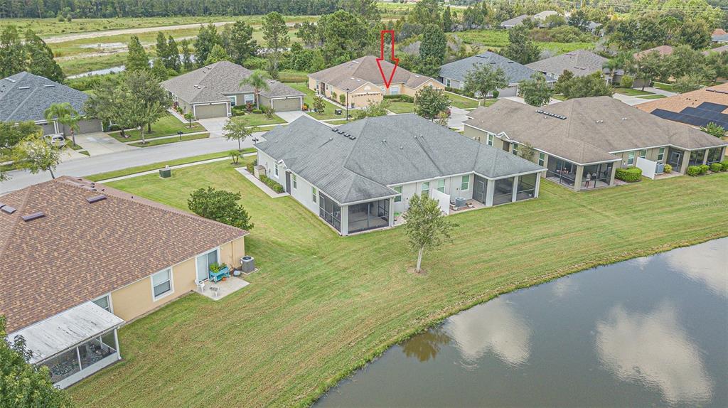 4256 Ashton Meadows Way Wesley Chapel, FL 33543 - Photo 33 of 42 an aerial view of a house with a yard