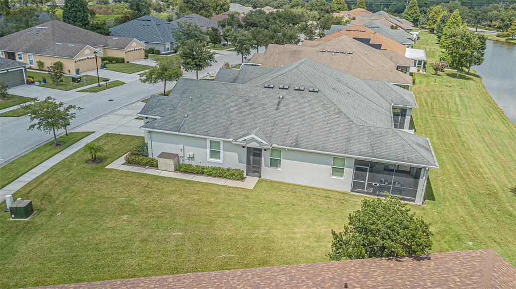 4256 Ashton Meadows Way Wesley Chapel, FL 33543 - Photo 35 of 42 an aerial view of residential houses with outdoor space