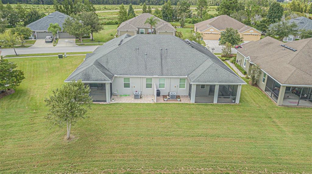 4256 Ashton Meadows Way Wesley Chapel, FL 33543 - Photo 38 of 42 a front view of a house with a yard